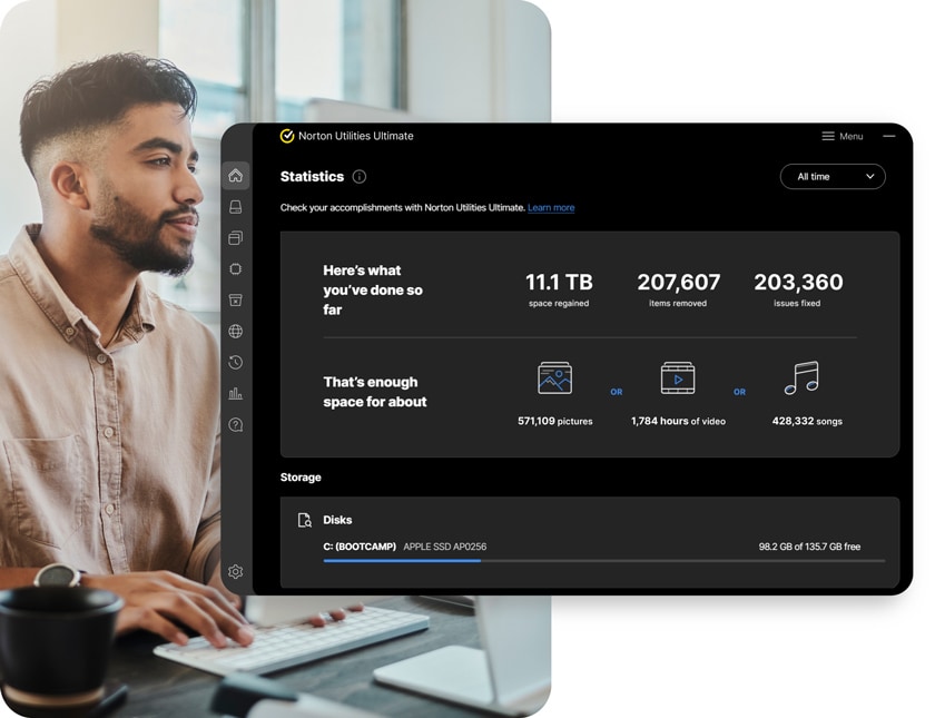 A man using Norton Utilities Ultimate to clean his PC.