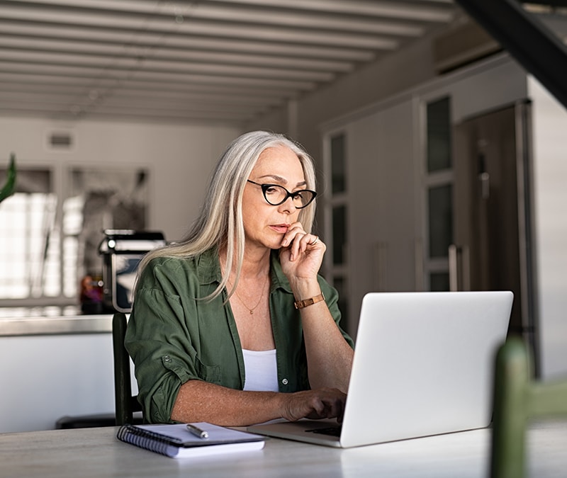 An image of a woman changing her IP address on a computer.