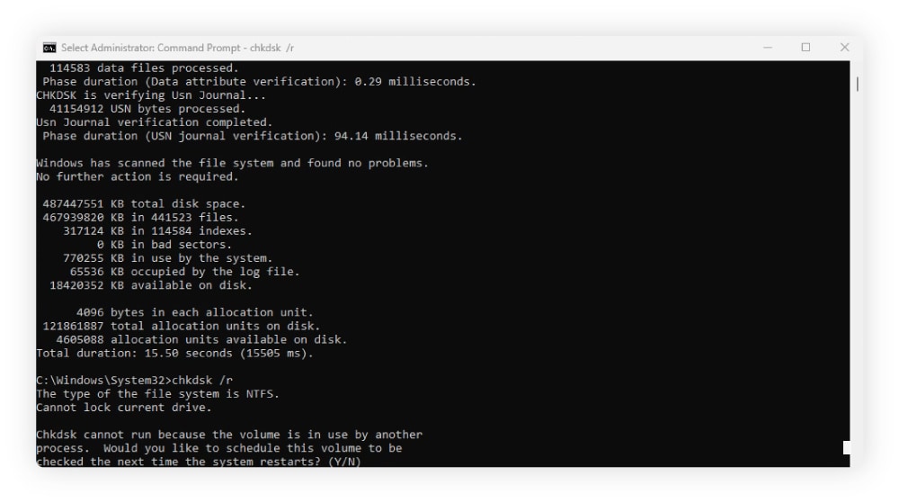 Screenshot of “disk in use” error when running the chkdsk command.