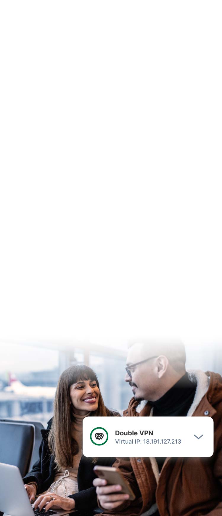 Two people use Norton double VPN to work securely on the airport Wi-Fi while waiting to board.