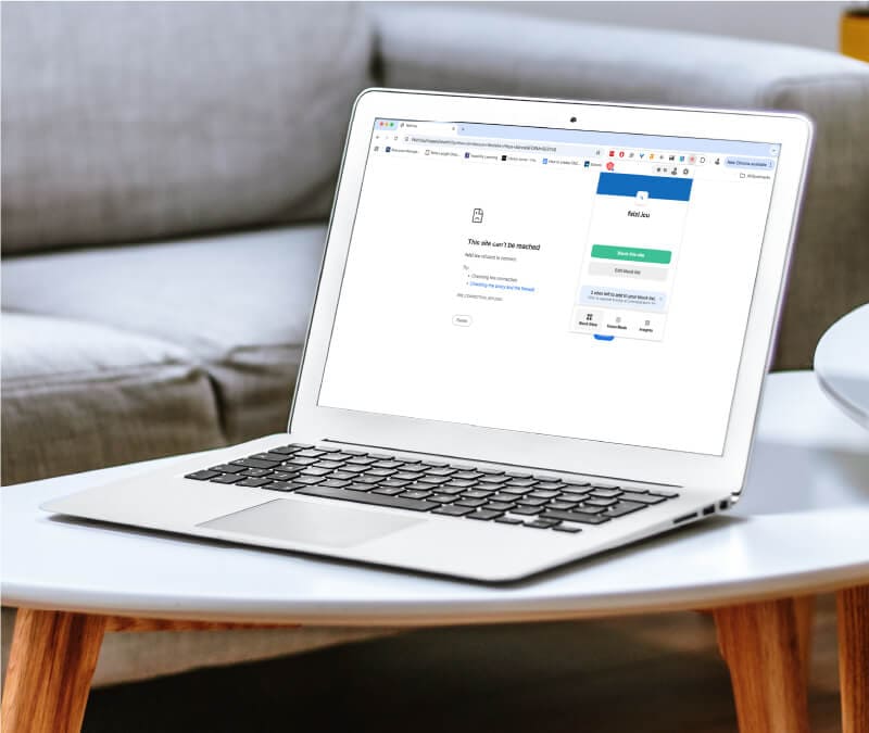 An image of a computer with a site-blocking browser extension.