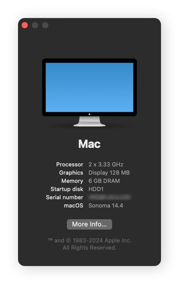 The About This Mac window displaying the computer's serial number.