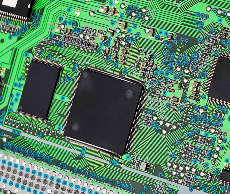 An image of the chips, circuits, and other components that make up a computer's motherboard.