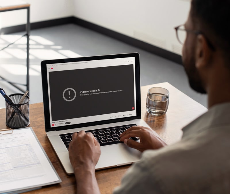 A user looking at a blocked video message on their device.