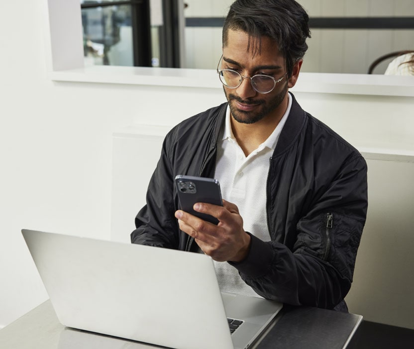 A man in glasses and jacket clearing cookies and cache in multiple browsers.