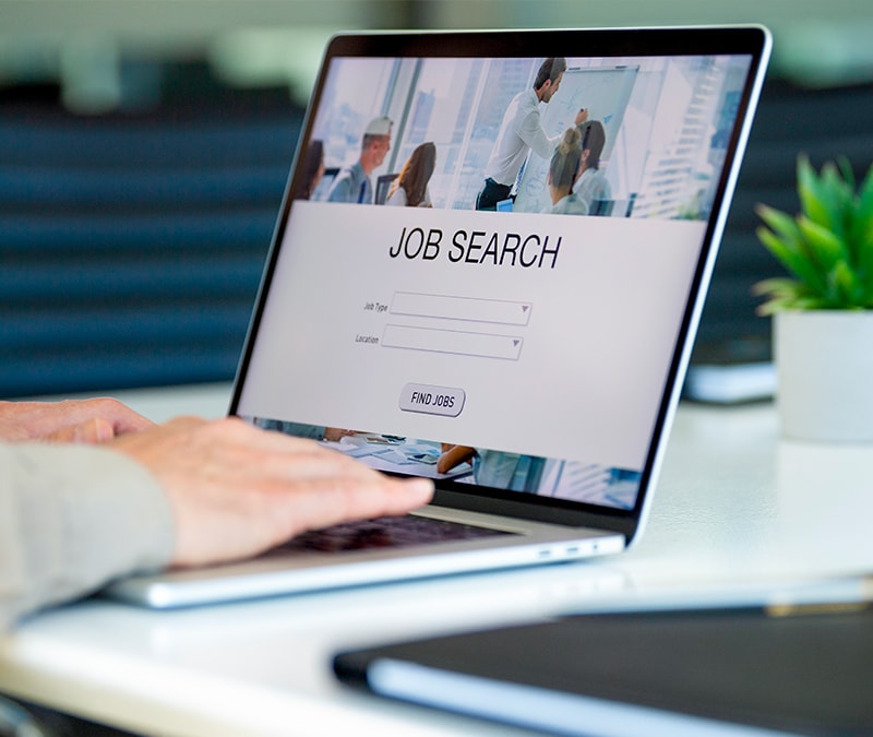 Someone looking for a job on a scam job search website.