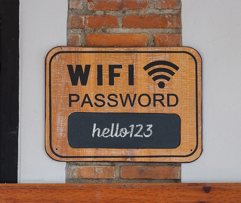 A sign displaying the wifi password.