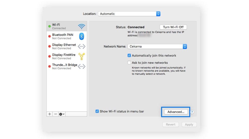 Selecting a network to configure with secure DNS in Mac's network settings.