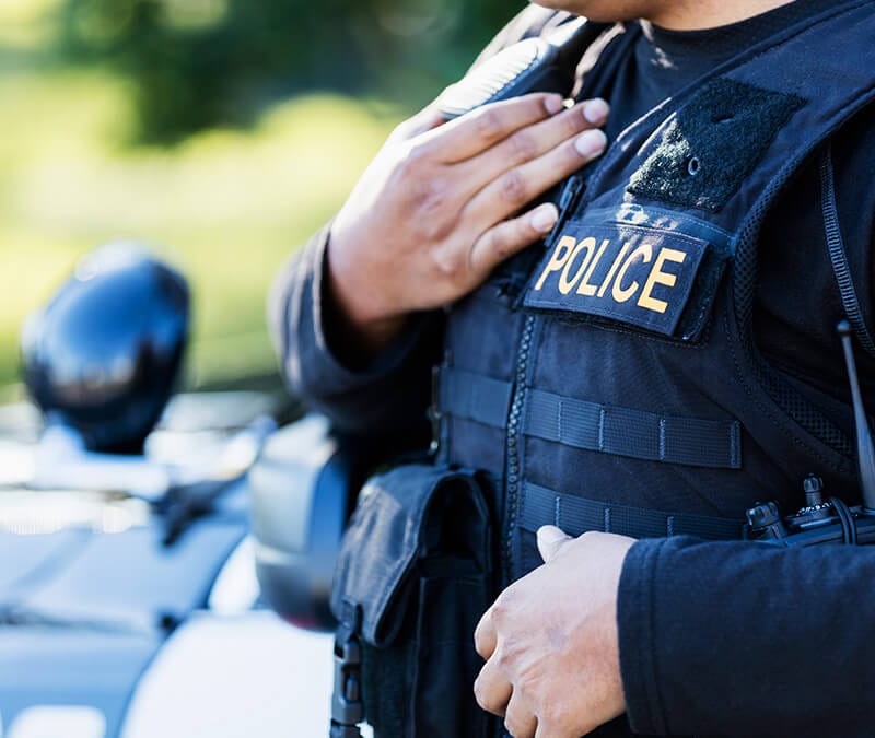 A police officer responds to a swatting call.