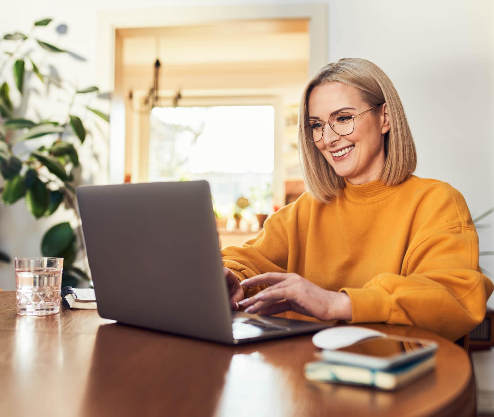 A woman browses the internet which is made possible by TCP/IP.