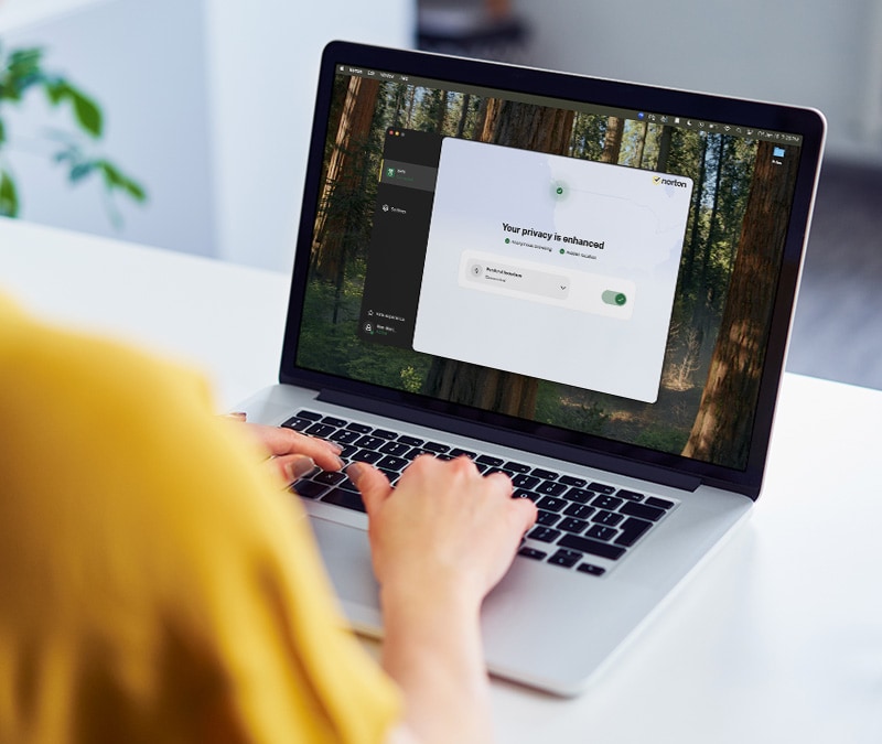 A user activates Norton VPN on their Mac computer.