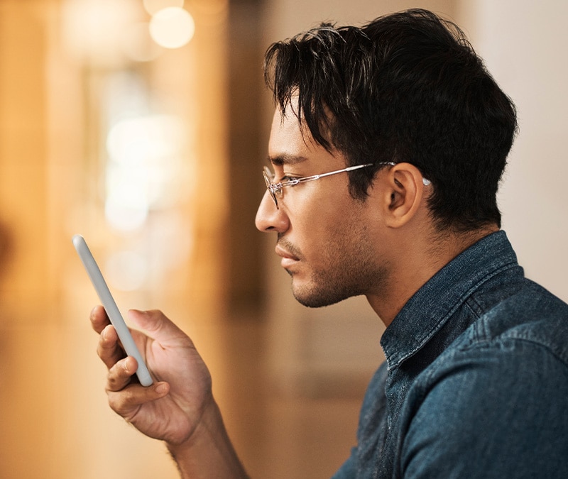 Man using Venmo on his phone.