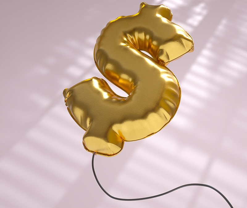 A picture of a golden balloon shaped like a dollar sign representing the cost of VPNs.