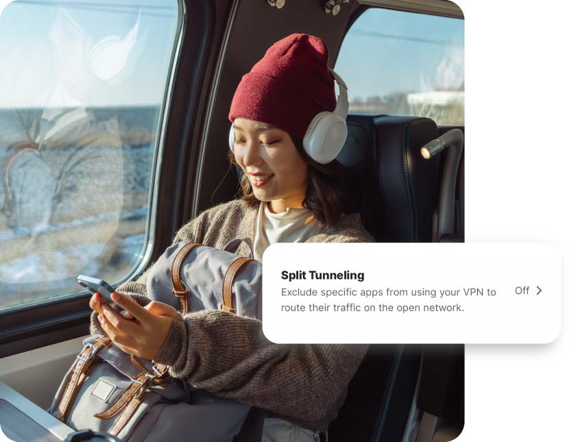 A woman uses her mobile VPN’s split tunneling feature for a more seamless VPN experience.