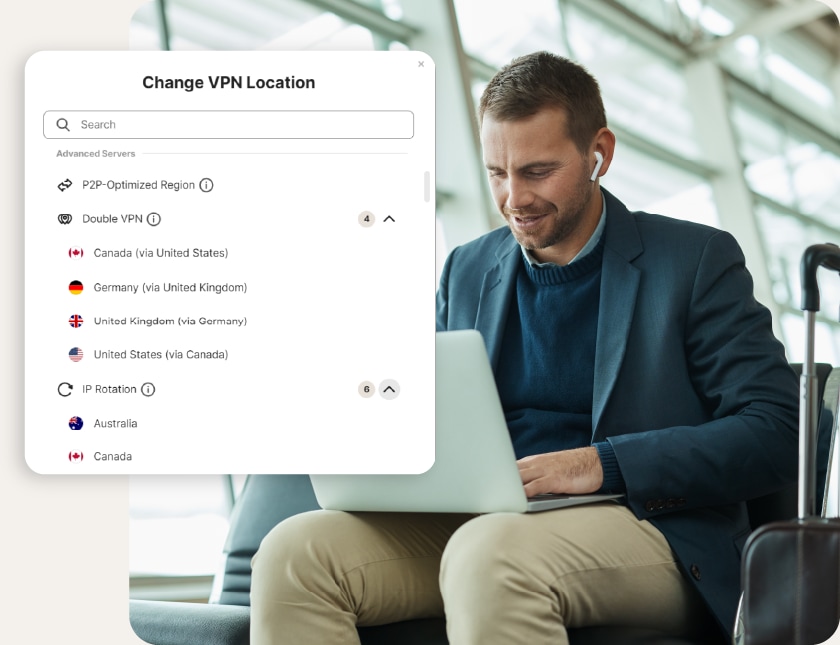 A man waiting at the airport uses his mobile VPN’s double-hop capabilities for added privacy.