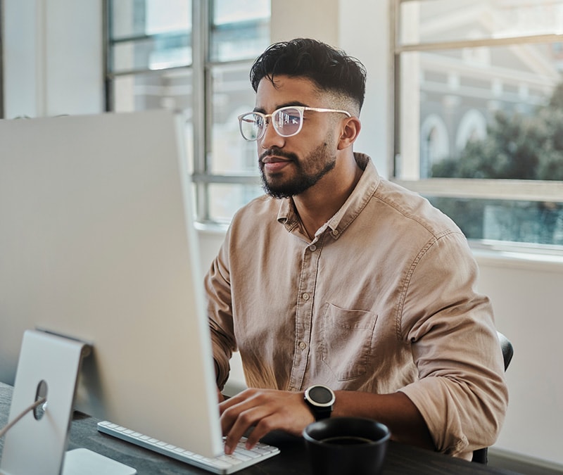 An image of a man clearing his Mac cache.