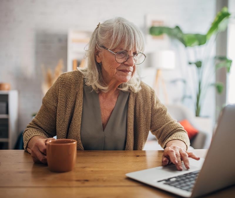 A woman scans a new message for signs of email spoofing.