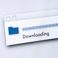 A person downloading a folder of sensitive data, illustrating the potential for data exposure.