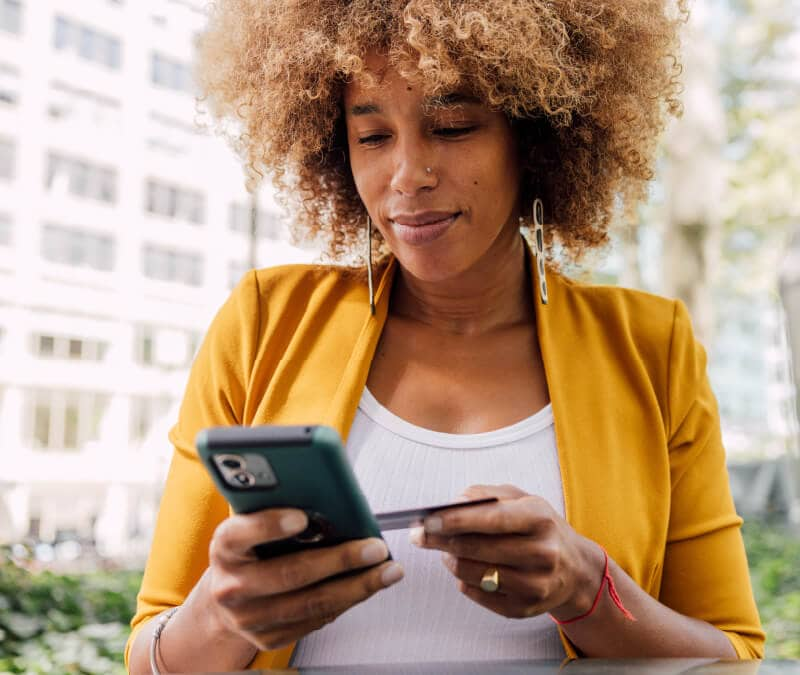 Image of a woman discovering she is the victim of a gift card scam.