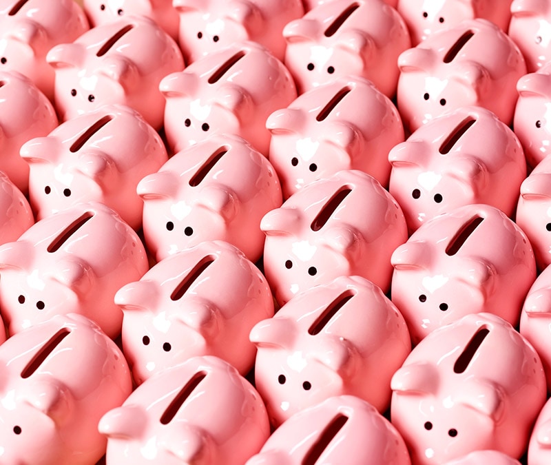 Rows and rows of piggy banks, symbolizing the pig butchering scam.