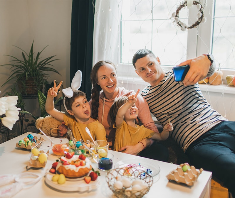 Parents sharenting, taking pictures with kids to share on social media. 