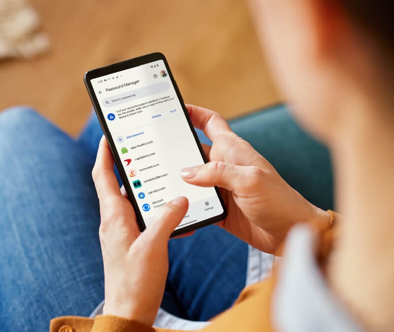 Someone on their phone trying to view saved passwords on Chrome